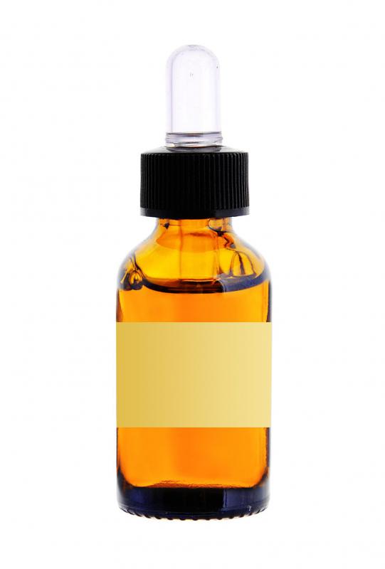 A bottle of bergamot oil, made from the peel of a bergamot orange.