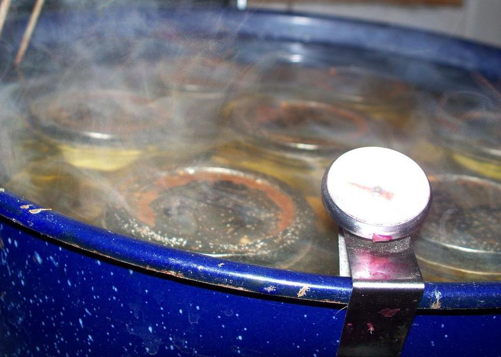 A boiling water canner may be used to safely sterilize canned foods.
