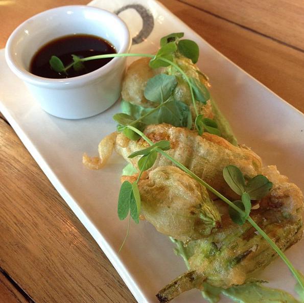 Gyoza is an Asian dumpling served with a sauce.