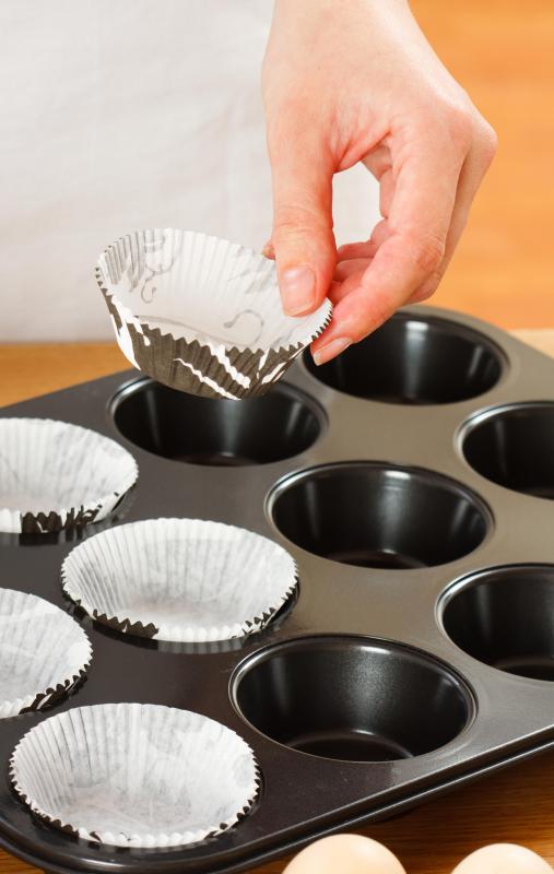 It is easier to remove cupcakes if the pan they've been baked in has been lined with wrappers.