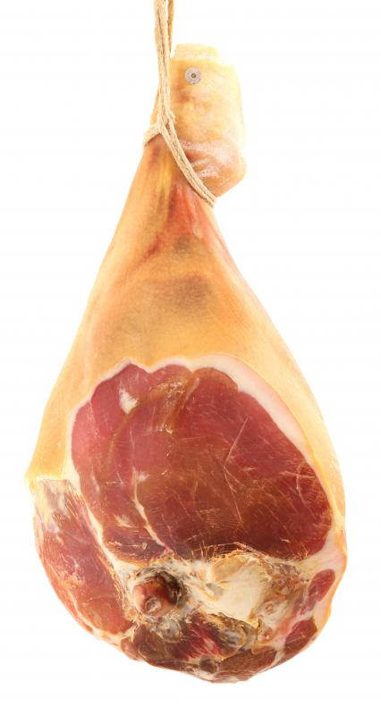 Curing prosciutto leg.