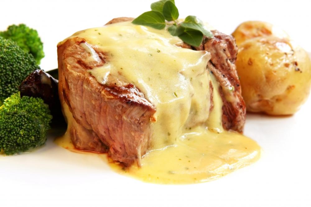 Filet mignon can be served with Bernaise sauce for added flavor.