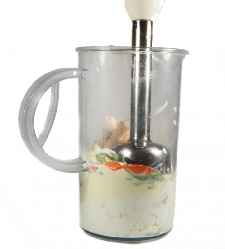 A handheld food processor may be used to chop or puree food.