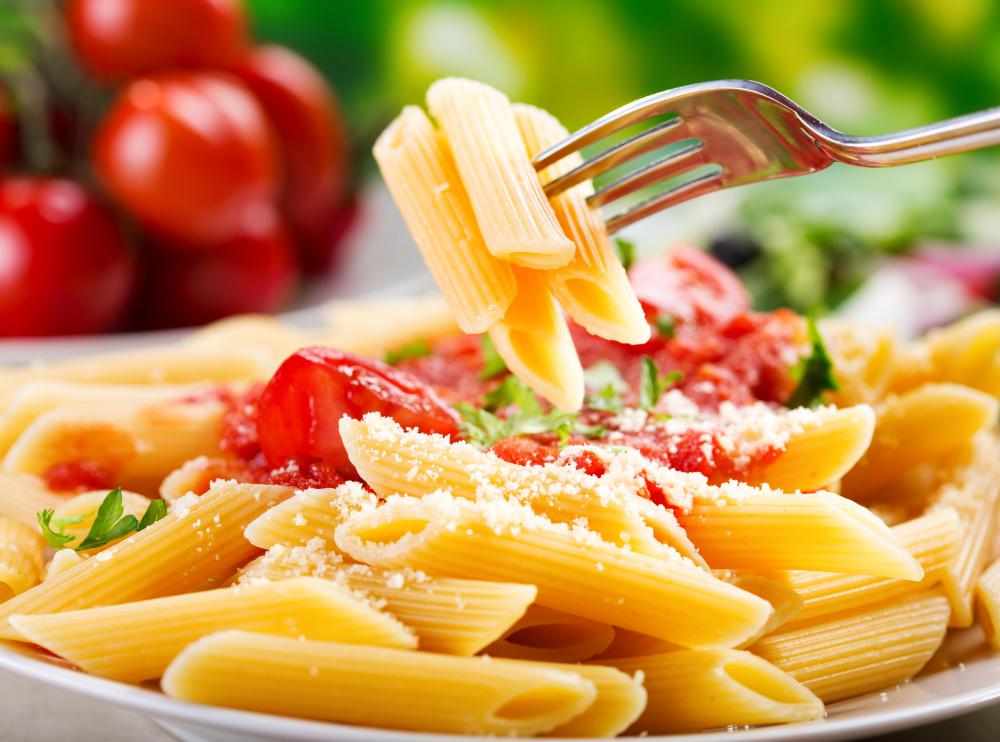 Parmesan cheese is popular on different kinds of pasta.