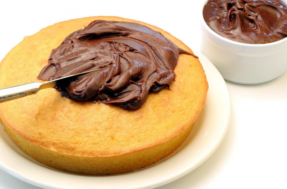 A crumb coat seals in the moisture of a cake.