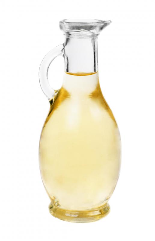 A serving bottle of vinegar.