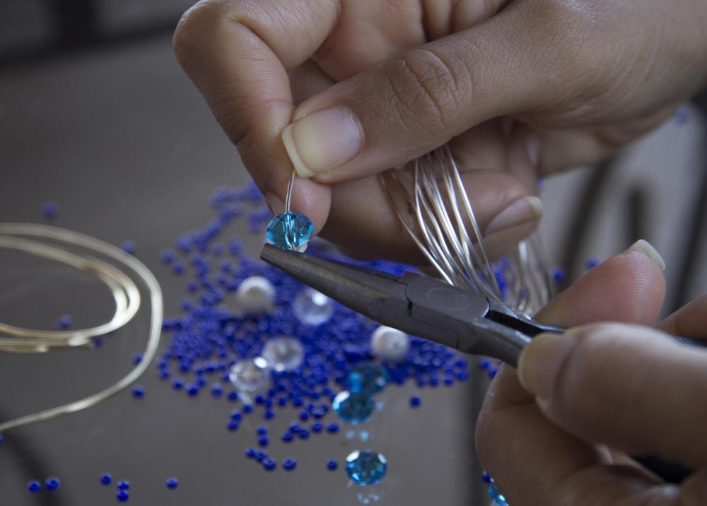 Handmade wine-glass charms are a nice gift.