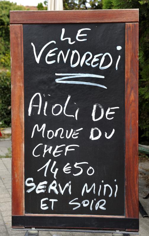 Sandwich boards outside a bistro may advertise the day's specials.