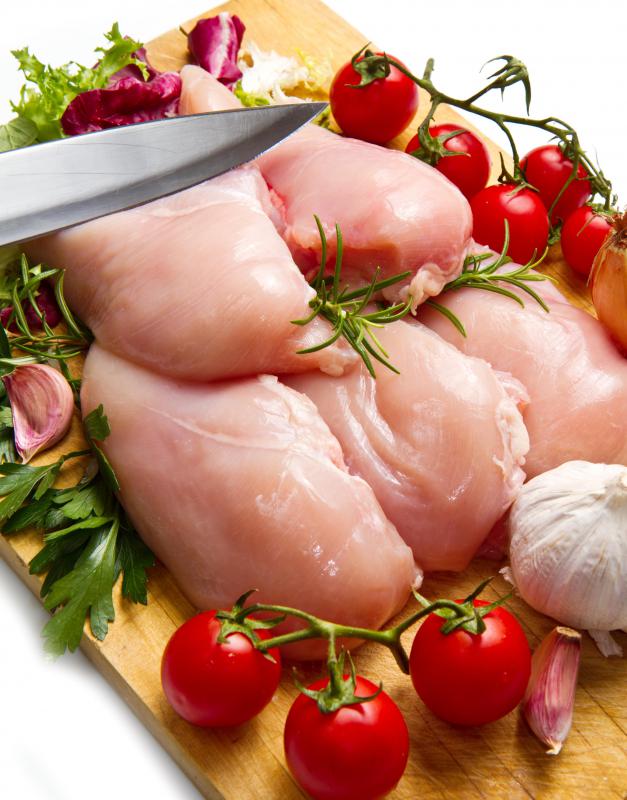 Chicken and tomato sauce are key elements in chicken parmesan.