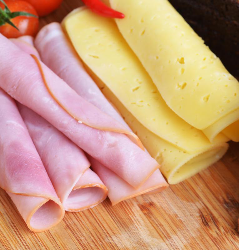 Croque-monsieurs typically contain sliced ham and Swiss cheese.