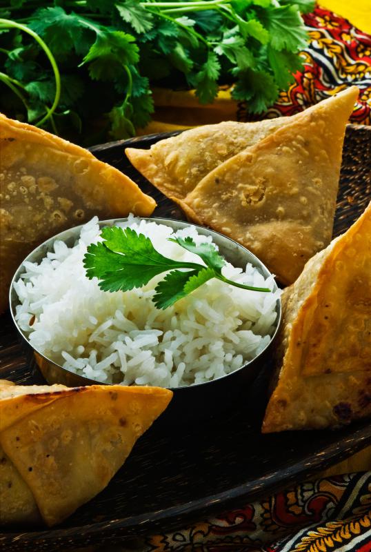 Samosas can be stuffed with vegetables only or with shredded chicken or lamb.