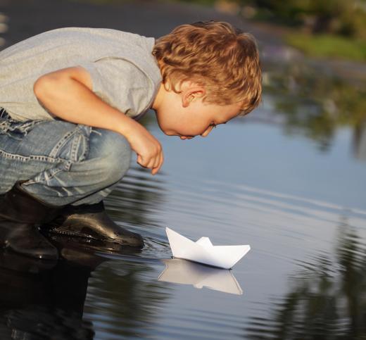 Origami boats made with wax paper will typically last longer on the water than boats made with ordinary paper.