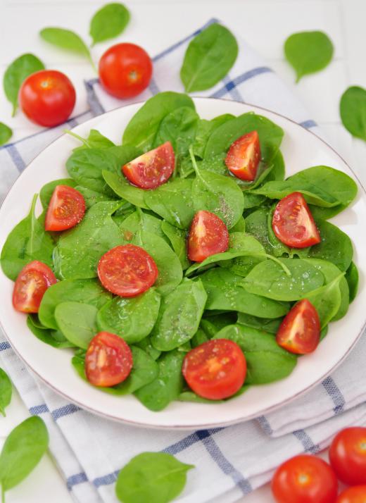 Spinach may be served in salads.