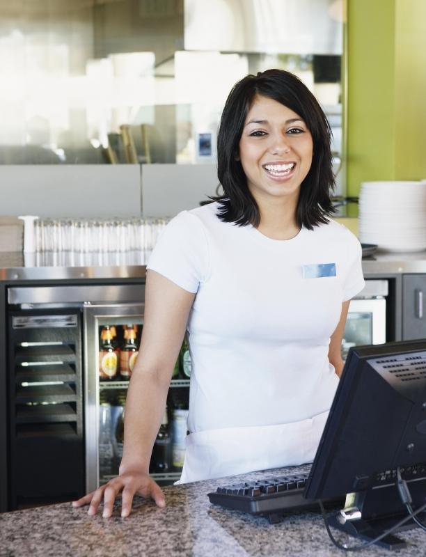 At a small cafe or restaurant, the server may also handle customers' bills.