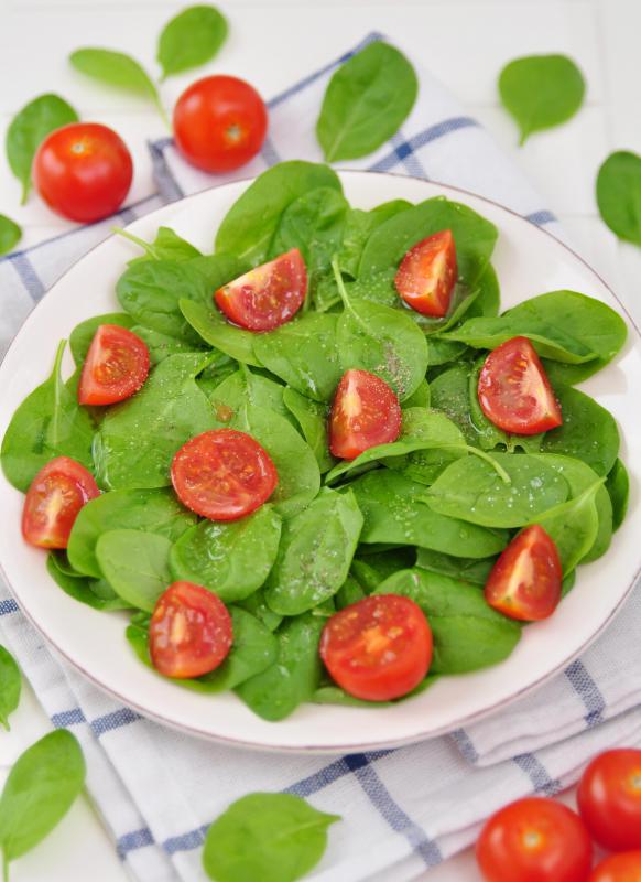 Spinach may be served in salads.