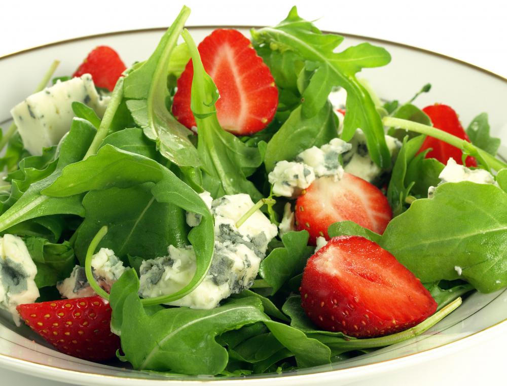 A salad with strawberries is a great barbecue side dish.