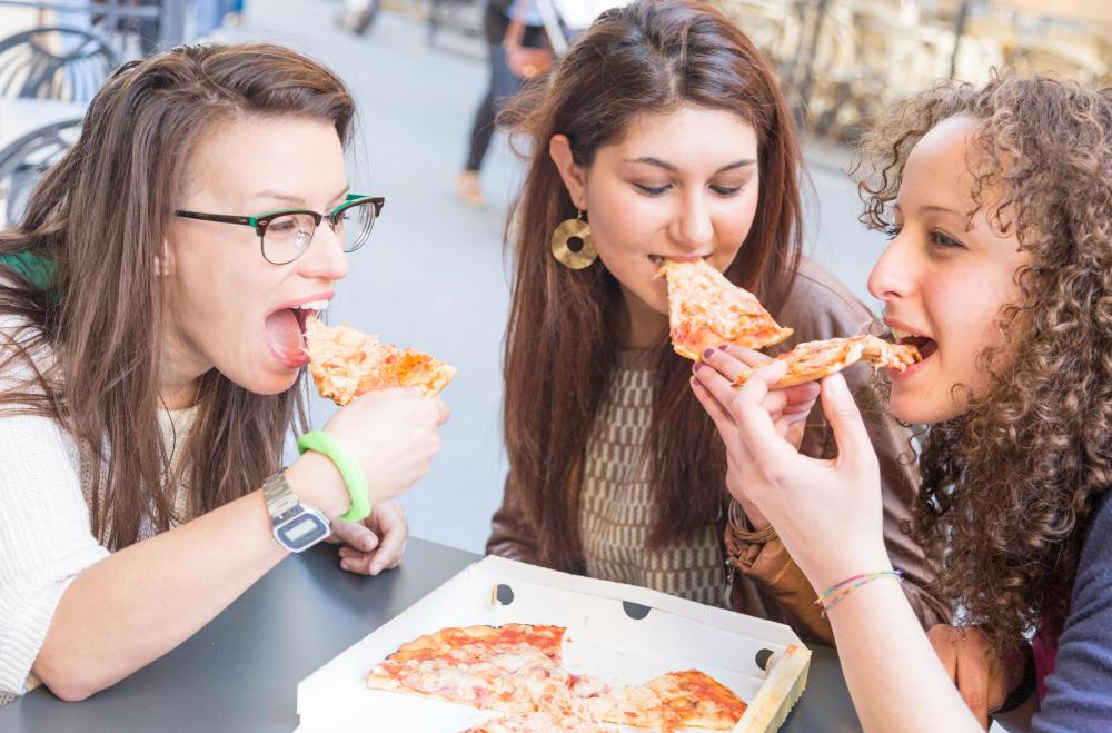On a pizza, the Maillard reaction occurs in both the cheese and the bread.