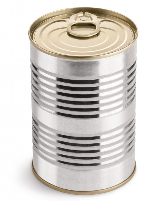 Evaporated milk is exposed to high heat to reduce its water content and then preserved in a can.