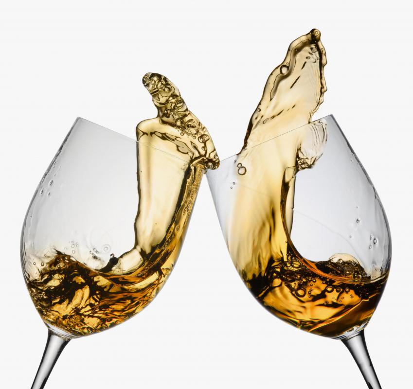 Toasting with white wine.