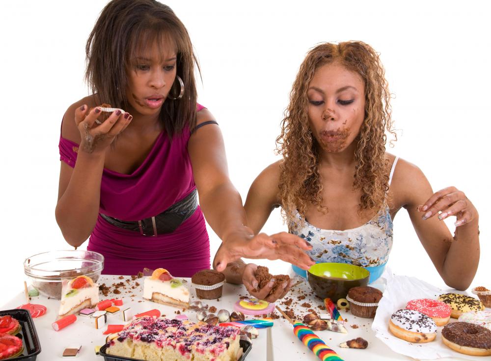 Food companies manufacture junk food with extremely addictive chemical additives.