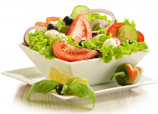 A Greek salad may be placed in a sandwich wrap.