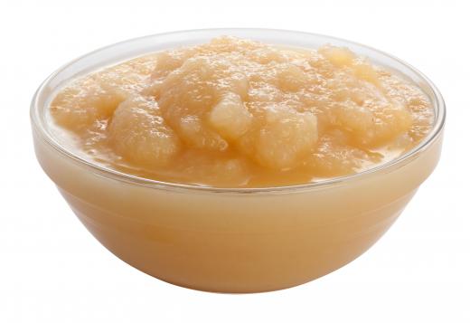 Applesauce, which is often served with breaded pork cutlets.