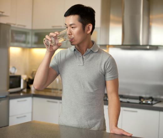 Drinking tonic water, also known as quinine water, has some reputed health benefits.