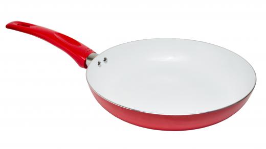 Skillets with baked enamel or porcelain interiors provide a nonstick surface for cooking.