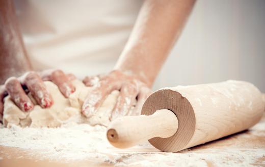 The dough bowl should be deep enough to accommodate a standard batch of dough.