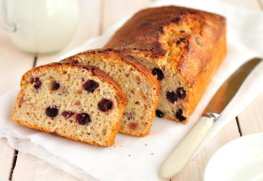 An assortment of breads and muffins, including those with fruit, are standard fare at a continental breakfast.