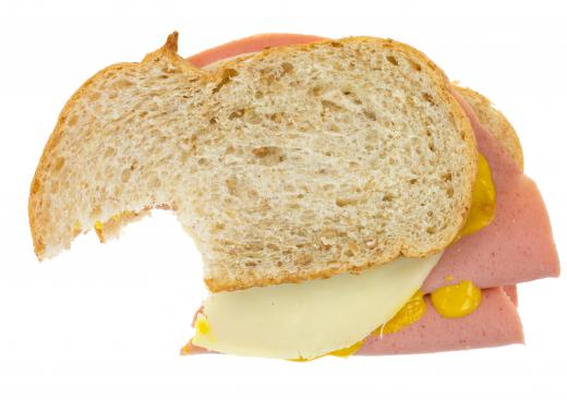 Lunch meat sandwiches are often packed in a lunch bag.