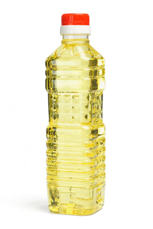 A bottle of corn syrup, which is often used for baking and making candy.