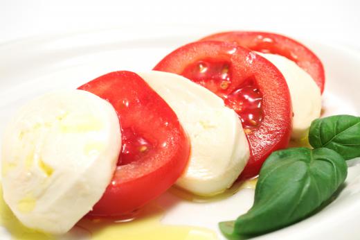 A caprese salad, which includes mozzarella.