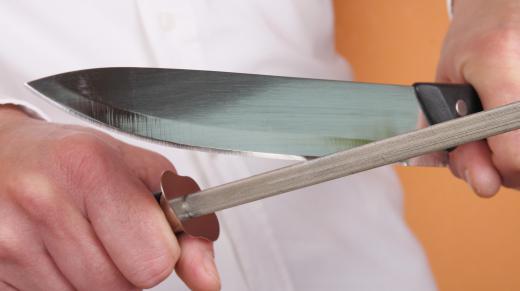 A sharpening rod is commonly used by chefs to quickly sharpen knives.