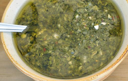 Chimichurri sauce contains chopped herbs and spices.