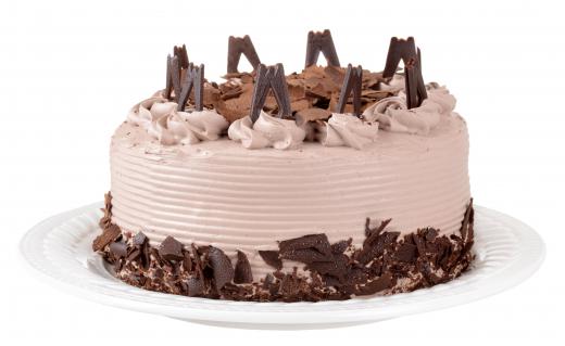 A black forest cake is often topped with chocolate shavings.