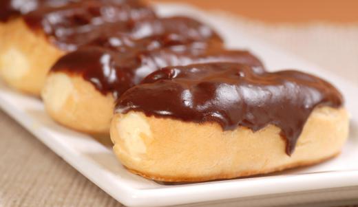 Chocolate eclairs may be filled with vanilla pastry cream.