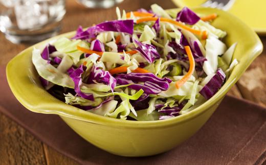 A chopped salad can include any number of ingredients, all of which have been chopped or tossed and then mixed in a bowl for serving.