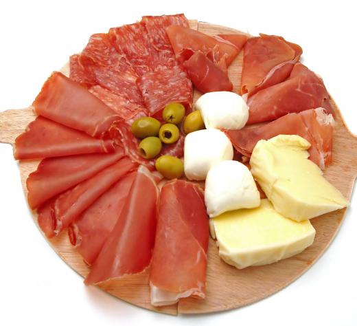 An appetizer platter with meat from a salumeria.