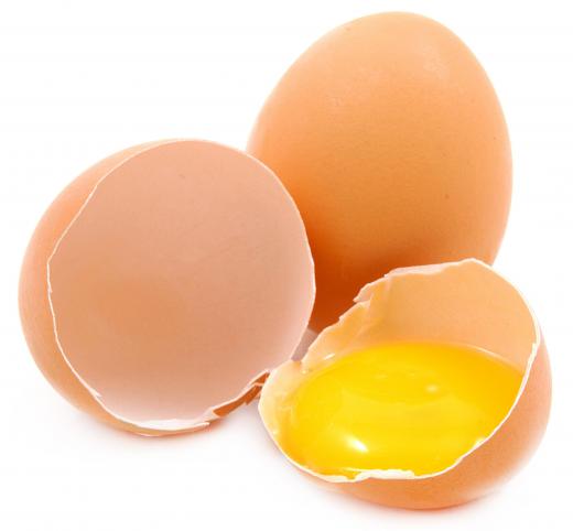 Eggs or egg yolks are commonly added to the mixture when making a hedgehog slice.