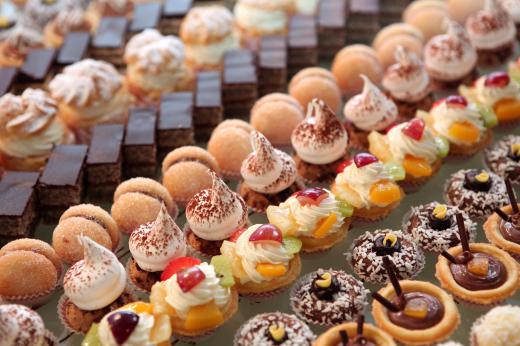 Pastry desserts on display at a bakery.