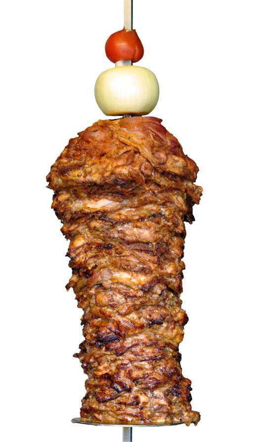 Lamb, beef or chicken is compressed and roasted on a vertical skewer.