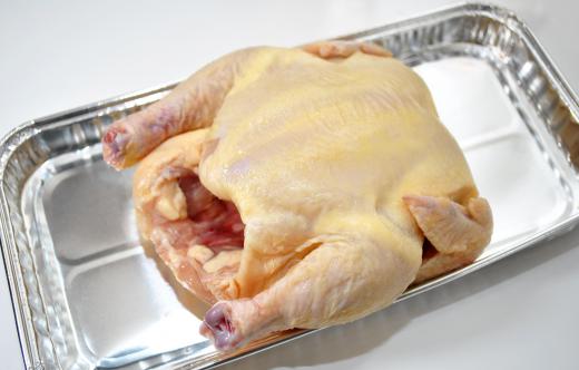 Salmonella is associated with raw chicken.