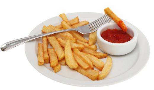 Steak fries may be served with ketchup.