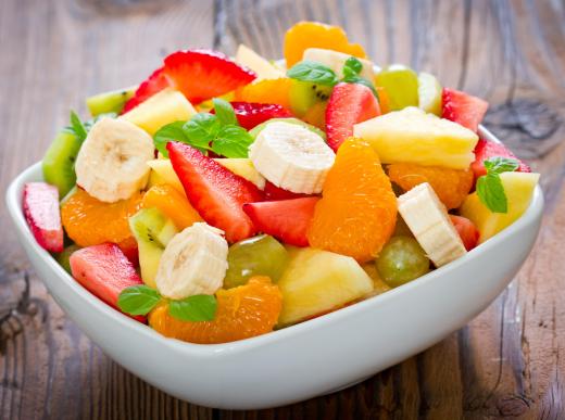 A strawberry corer is useful when preparing a fruit salad.