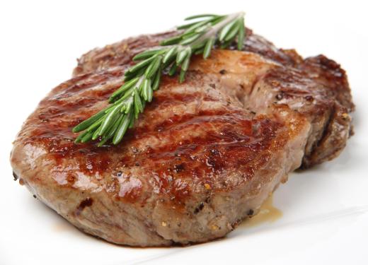 A grilled steak made with a rosemary marinade.