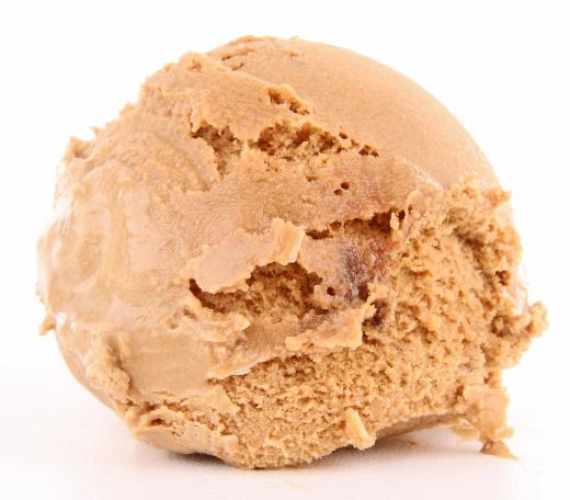 A scoop of butterscotch ice cream.