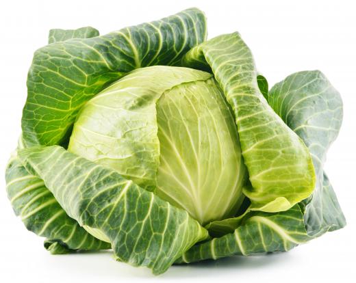 To make cabbage rolls at home, select a large, healthy cabbage for the best leaves.