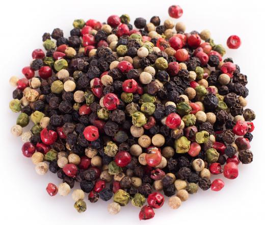 Peppercorns are dried and used as a seasoning, commonly found in peppermills, among other types of peppercorns.