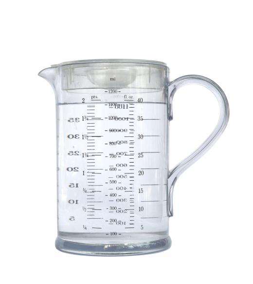 Liquid measuring cups are usually clear and have spouts.